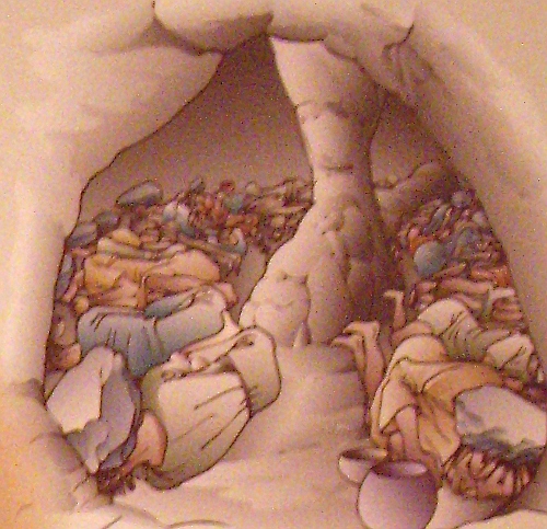 Reconstrucción de la Cueva 1 de la necrópolis de Marroquíes Altos. Los individuos aparecieron con los cráneos machacados por grandes piedras. Fuente: redjaen.es/francis